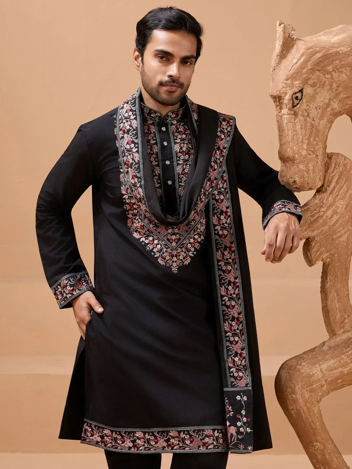 Black embroidered kurta with floral and deer motifs, perfect for Indian ethnic wear occasions
