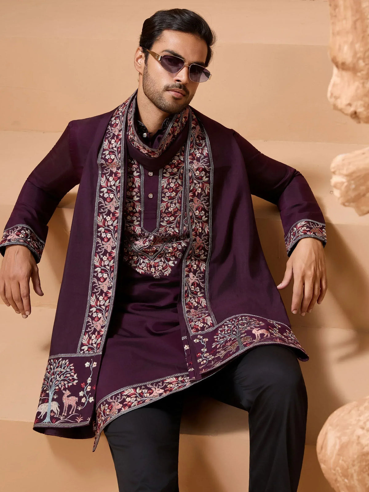 Men's purple embroidered kurta set with floral and deer motifs, perfect for ethnic occasions