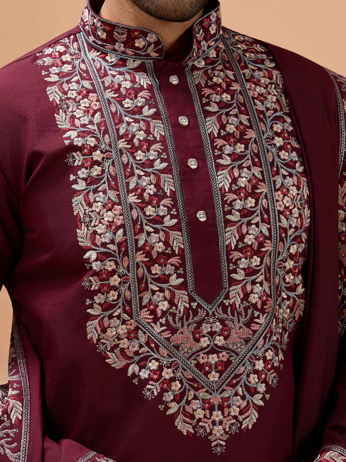 Maroon kurta with intricate floral embroidery, perfect for Indian ethnic wear occasions