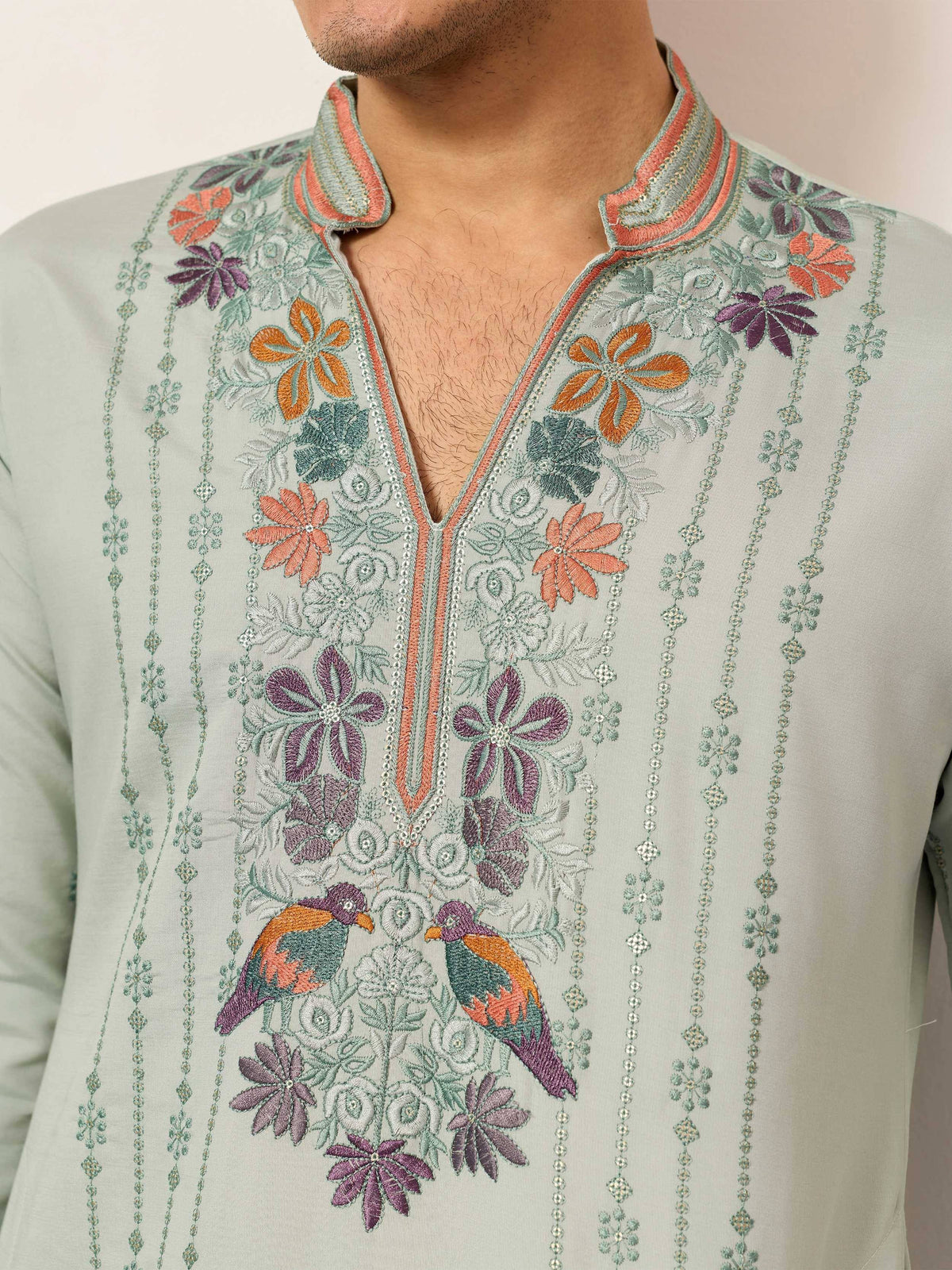 Men's embroidered kurta with floral and bird designs, perfect for ethnic wear