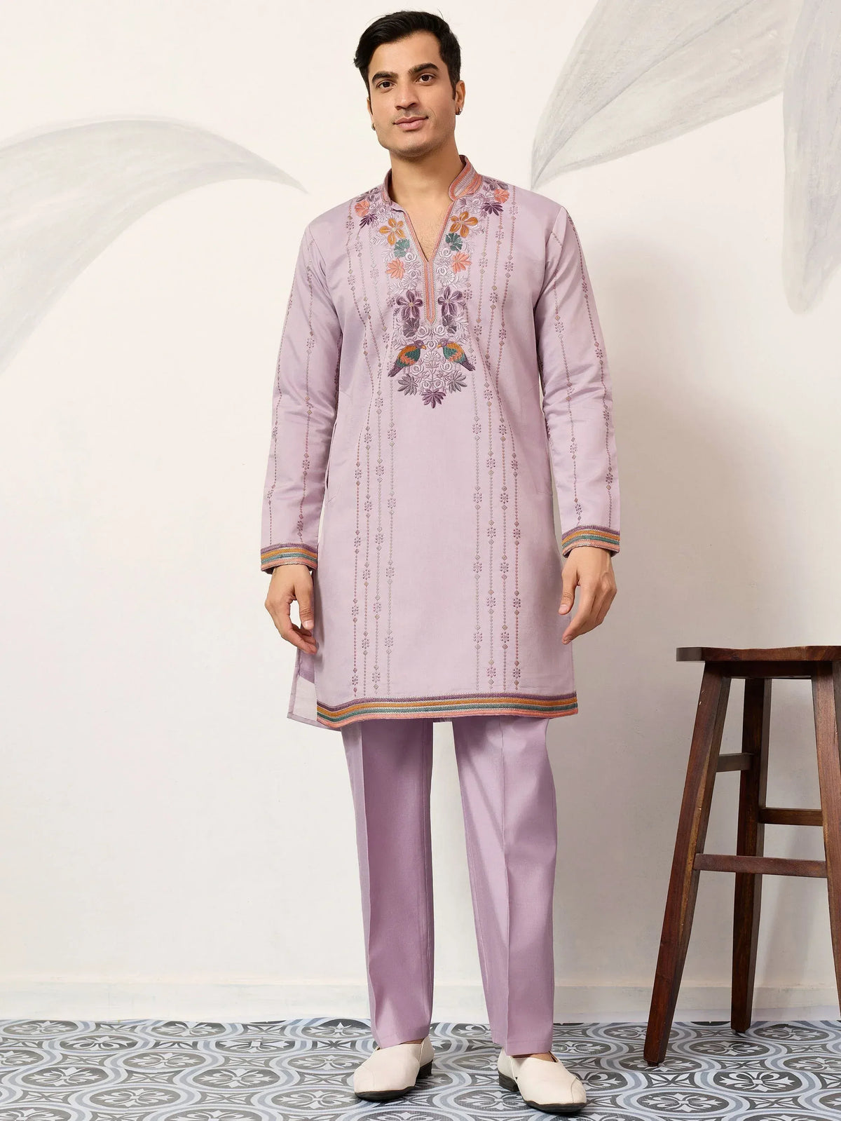 Lavender embroidered kurta set with floral and bird motifs, perfect for Indian ethnic occasions