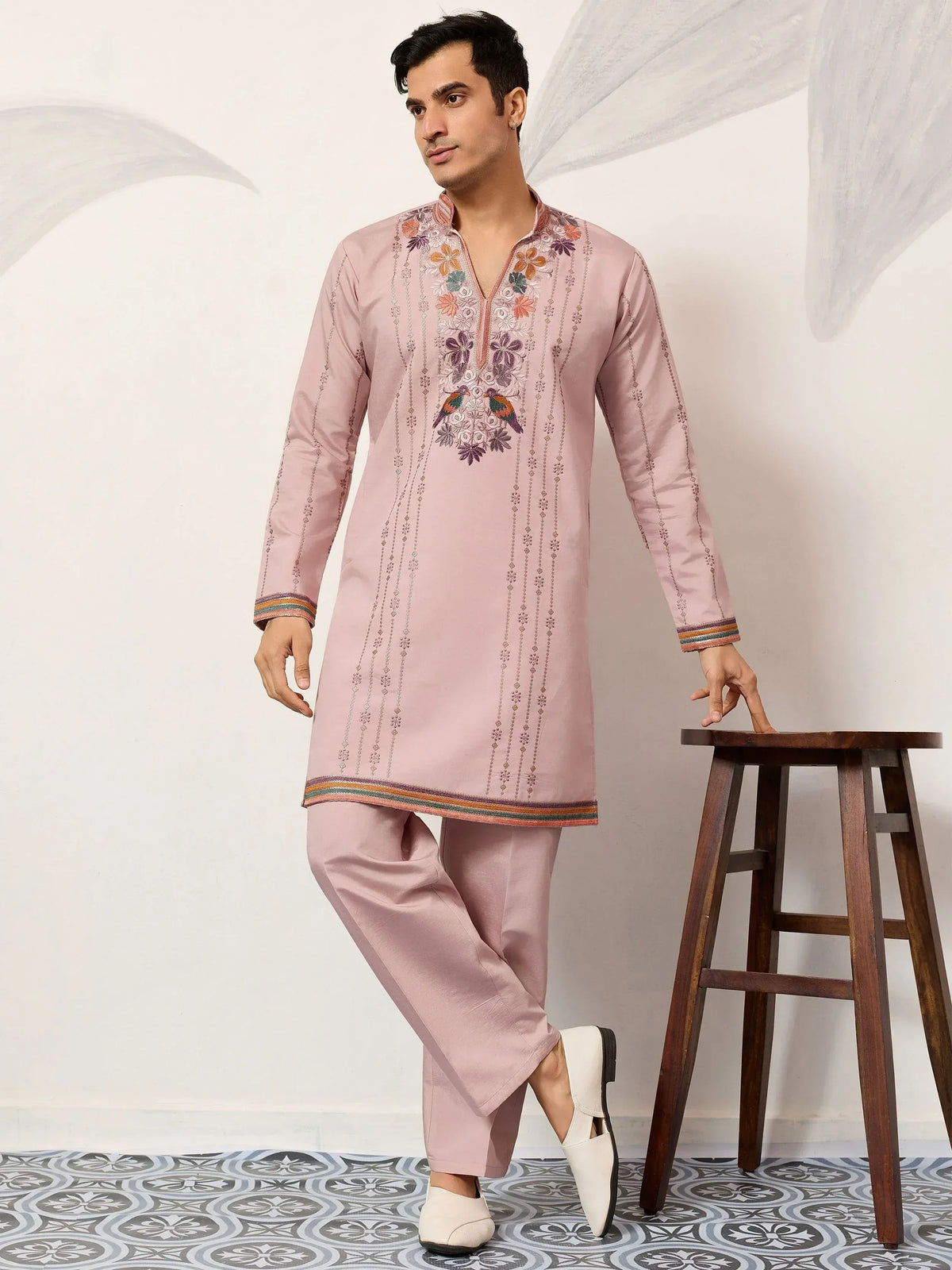 Pink embroidered kurta set with floral and bird motifs, paired with matching pants for men's ethnic wear