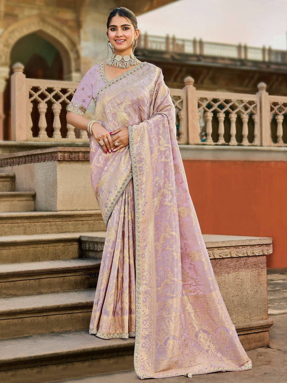 Elegant lavender saree with gold embroidery, perfect for Indian ethnic wear occasions
