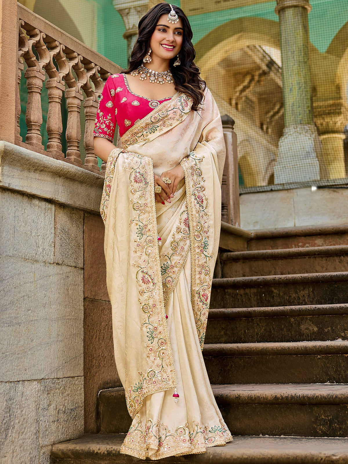Cream embroidered saree with pink blouse, perfect for Indian ethnic wear and festive occasions.