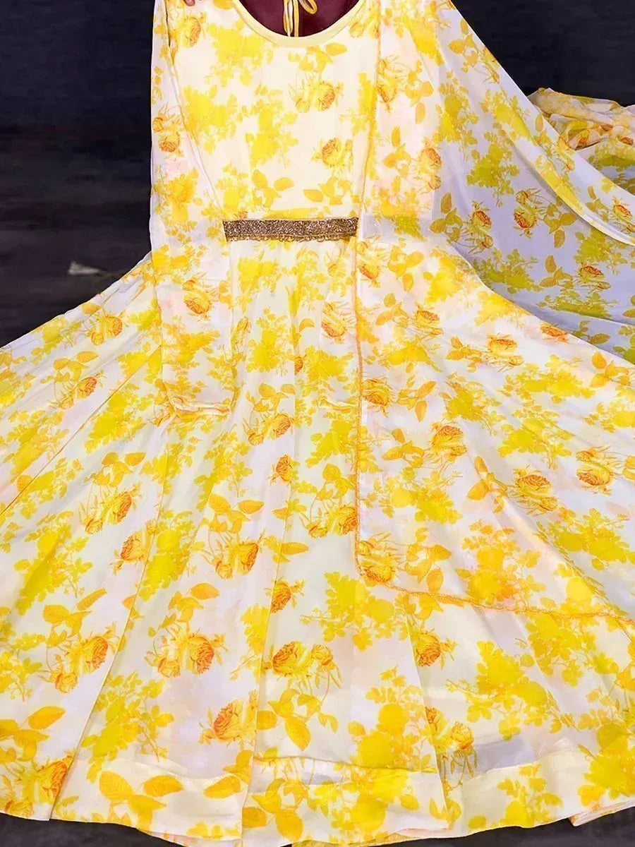 Yellow floral print ethnic gown with gold belt, perfect for festive occasions and weddings