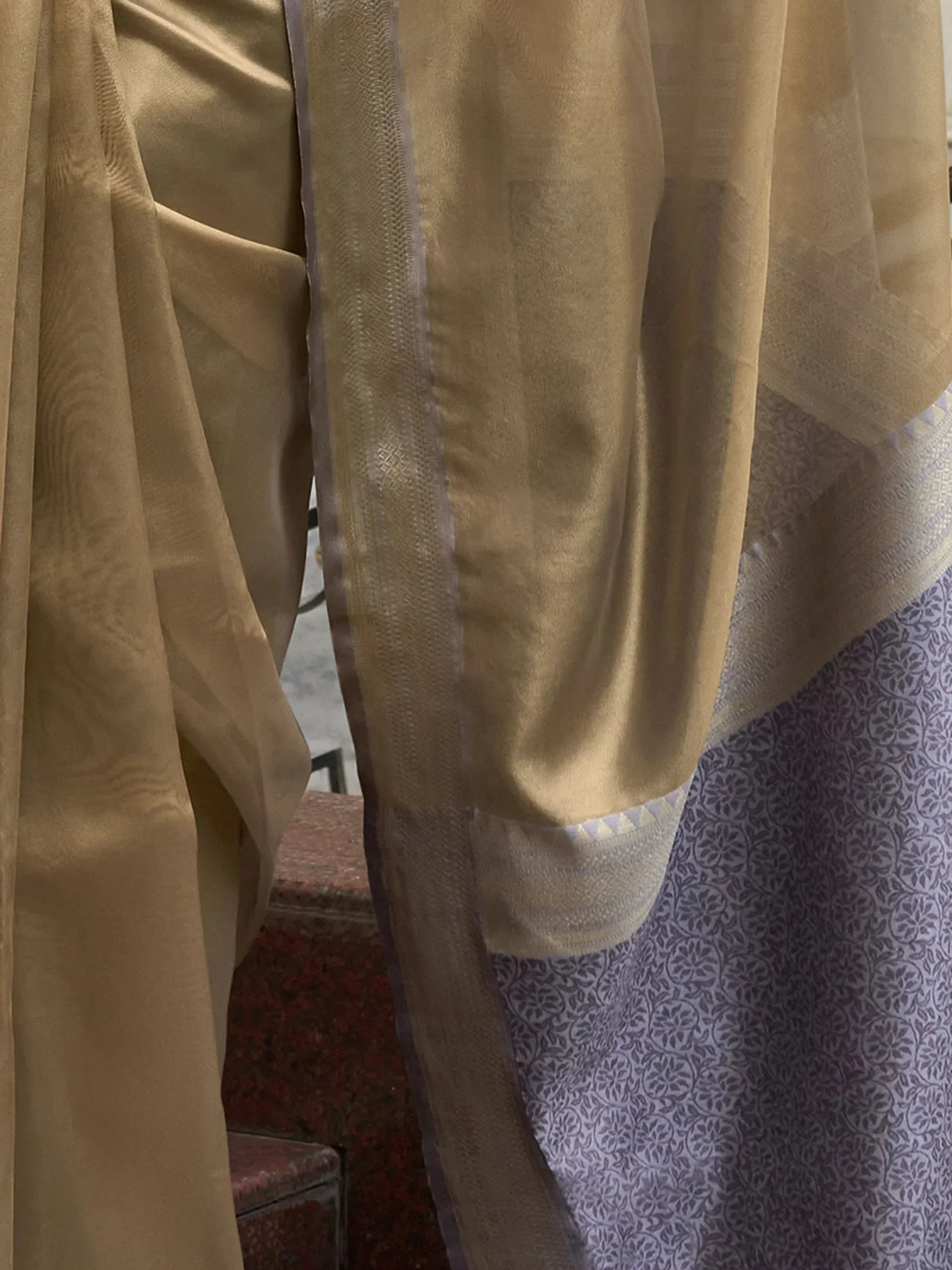 Golden sheer dupatta with delicate border paired with purple printed salwar kameez, ethnic wear
