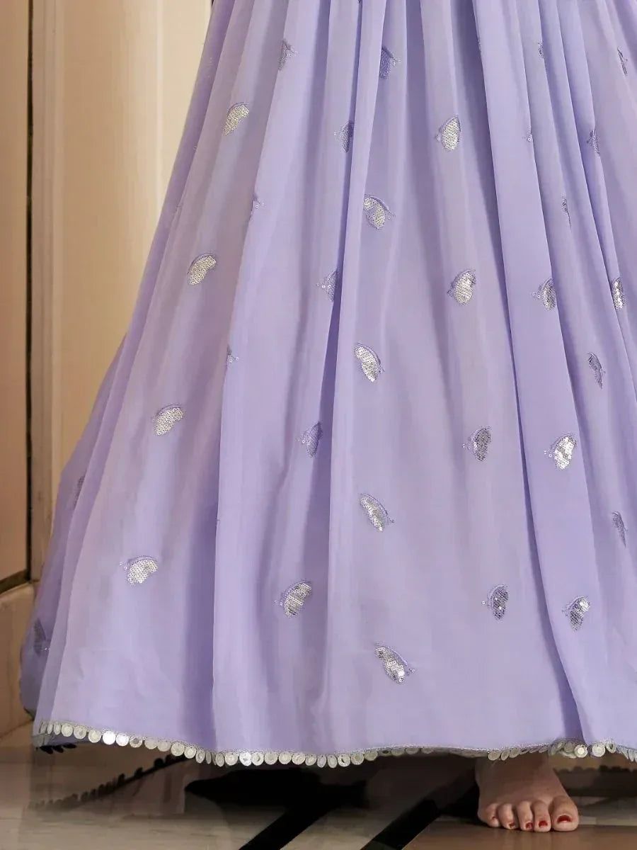 Lavender ethnic gown with silver sequin embroidery and scalloped hem, perfect for festive occasions