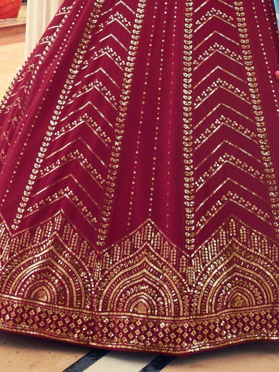 Maroon lehenga with gold chevron and floral embroidery, ethnic Indian wear