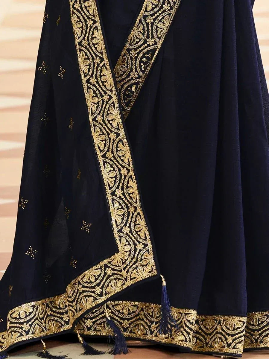 Navy blue ethnic gown with gold embroidery and tassels, designer Indian wear