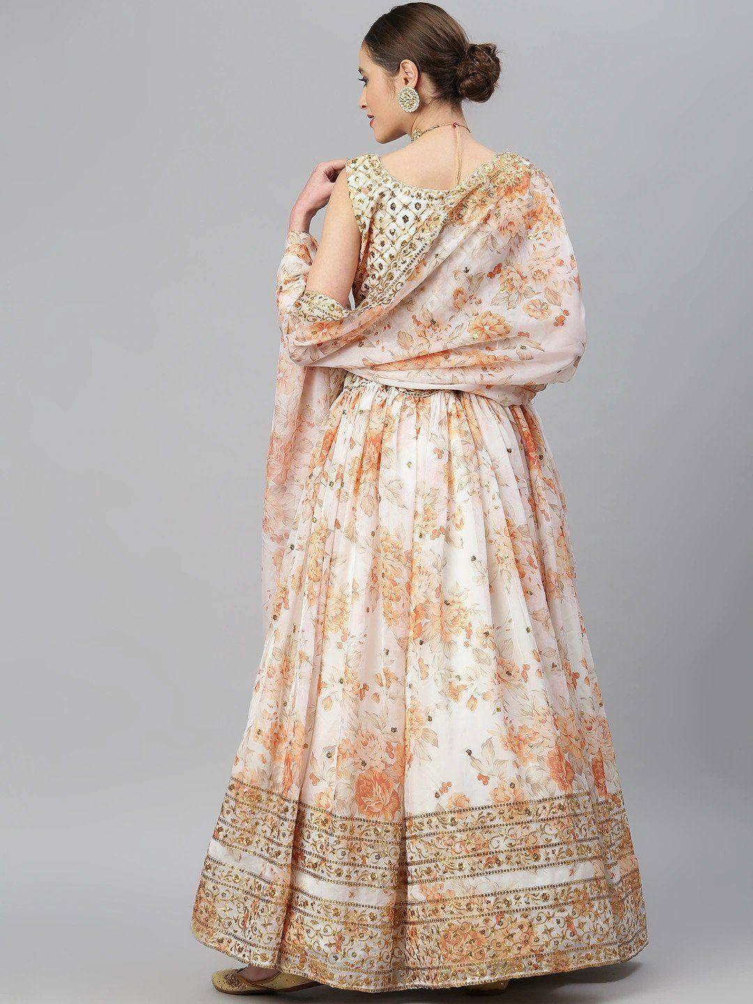 Elegant floral print lehenga choli with gold embroidery, perfect for Indian ethnic occasions