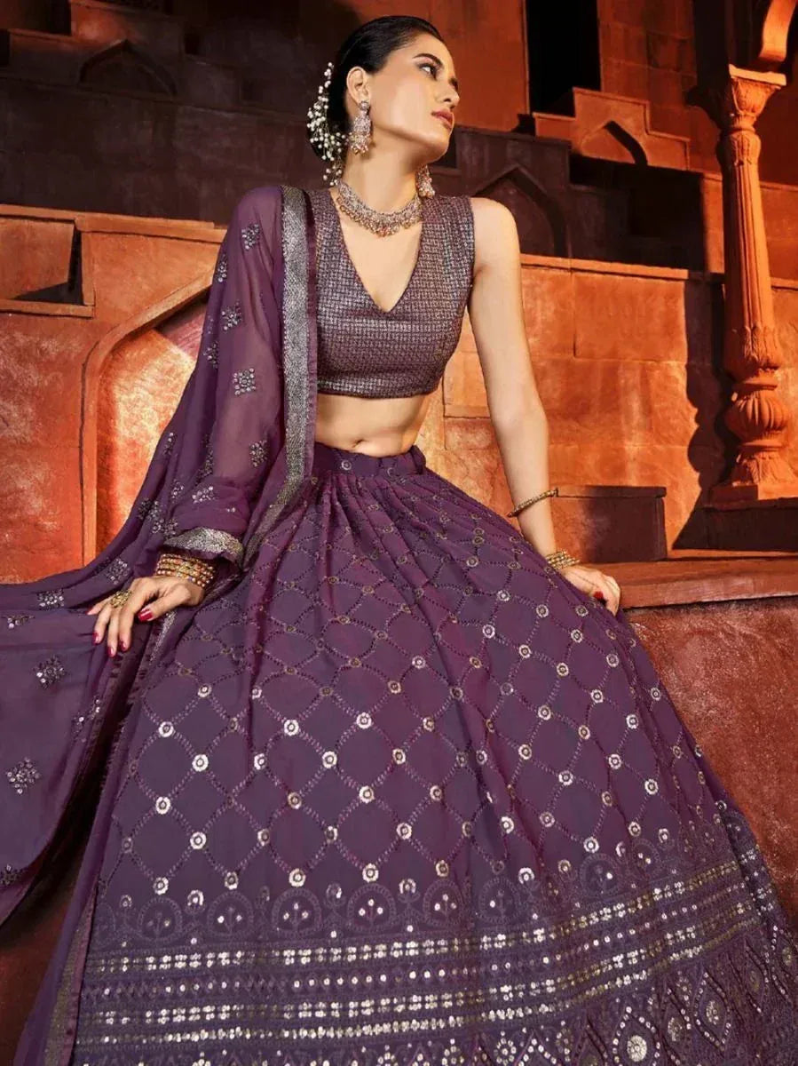 Purple designer lehenga choli with intricate embroidery and sequin work, perfect for Indian ethnic occasions