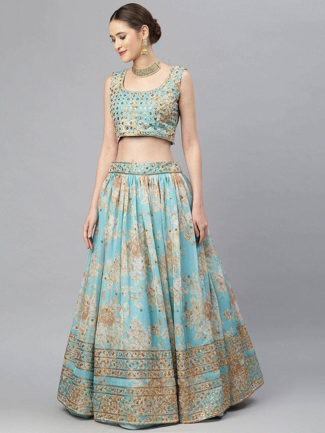 Turquoise floral lehenga choli with gold embroidery, perfect for Indian ethnic occasions