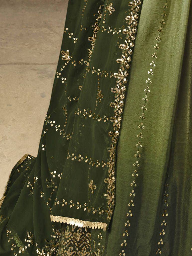 Green ethnic lehenga choli with gold sequin embroidery and scalloped hem detail