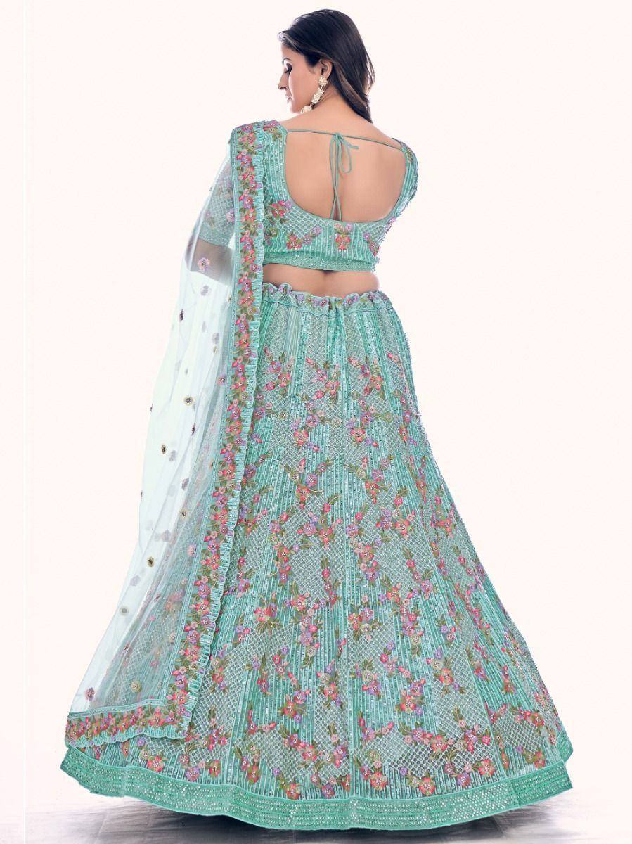 Mint green floral embroidered lehenga choli with back tie blouse and sheer dupatta, perfect for Indian ethnic wear occasions.