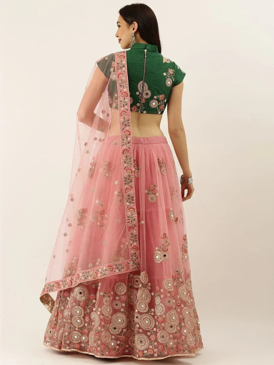 Pink embroidered lehenga choli with green blouse, floral mirror work, sheer dupatta for Indian ethnic wear