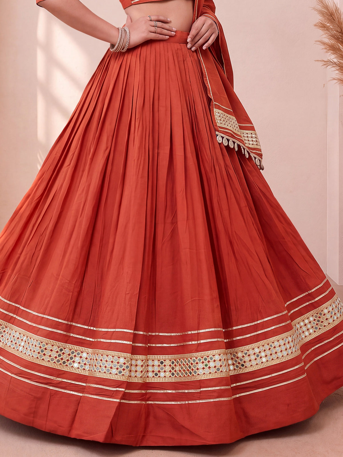 Stylish Rust Orange Mirror Laced Cotton Navratri Special Lehenga Choli