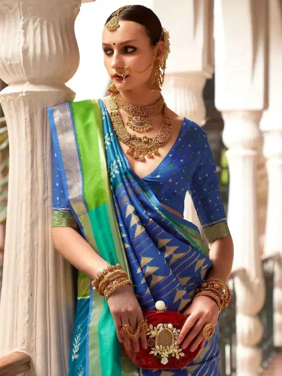 Blue and green designer saree with gold jewelry, perfect for Indian ethnic wear occasions