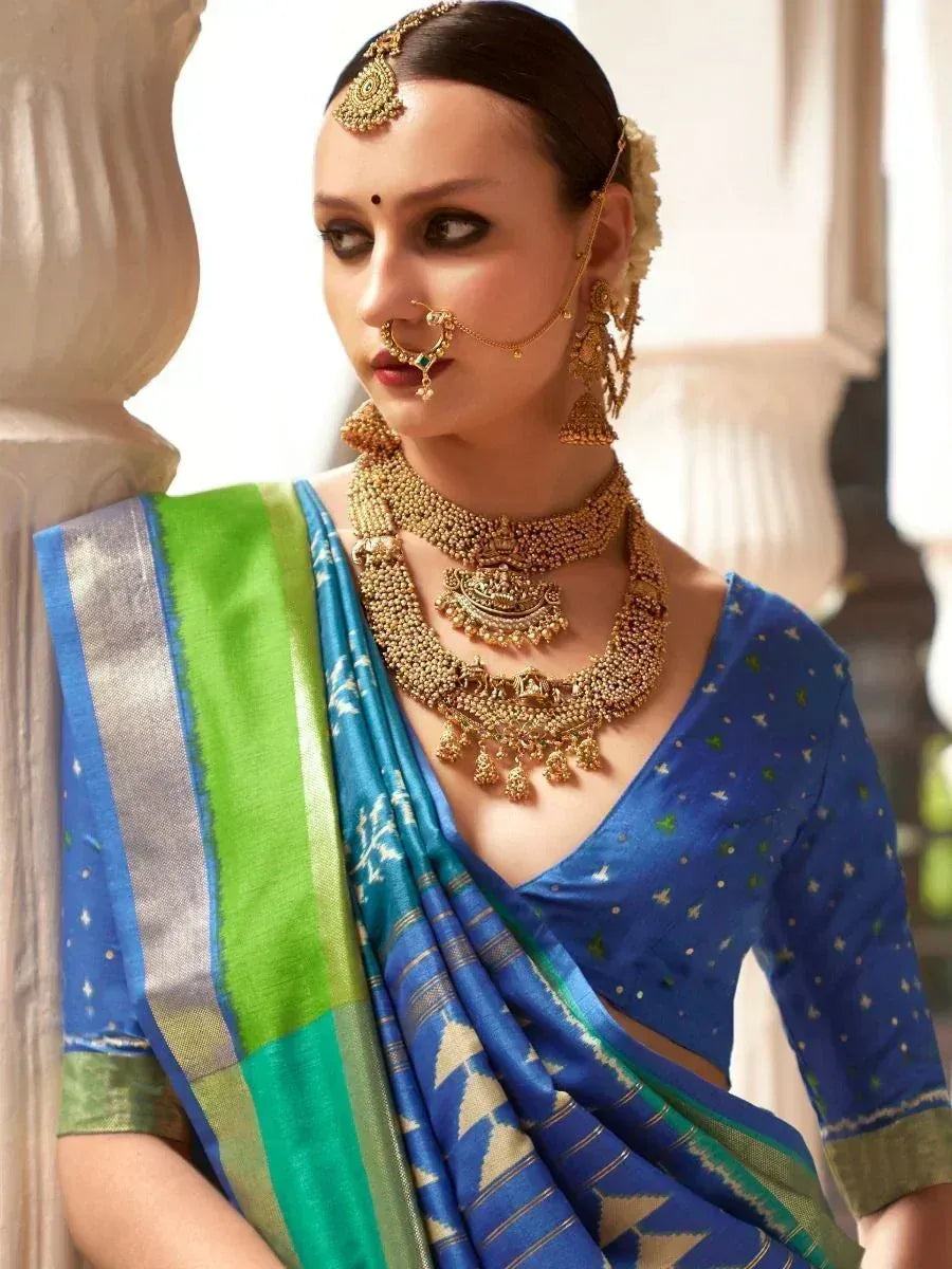 Blue and green designer saree with gold jewelry, traditional Indian ethnic wear
