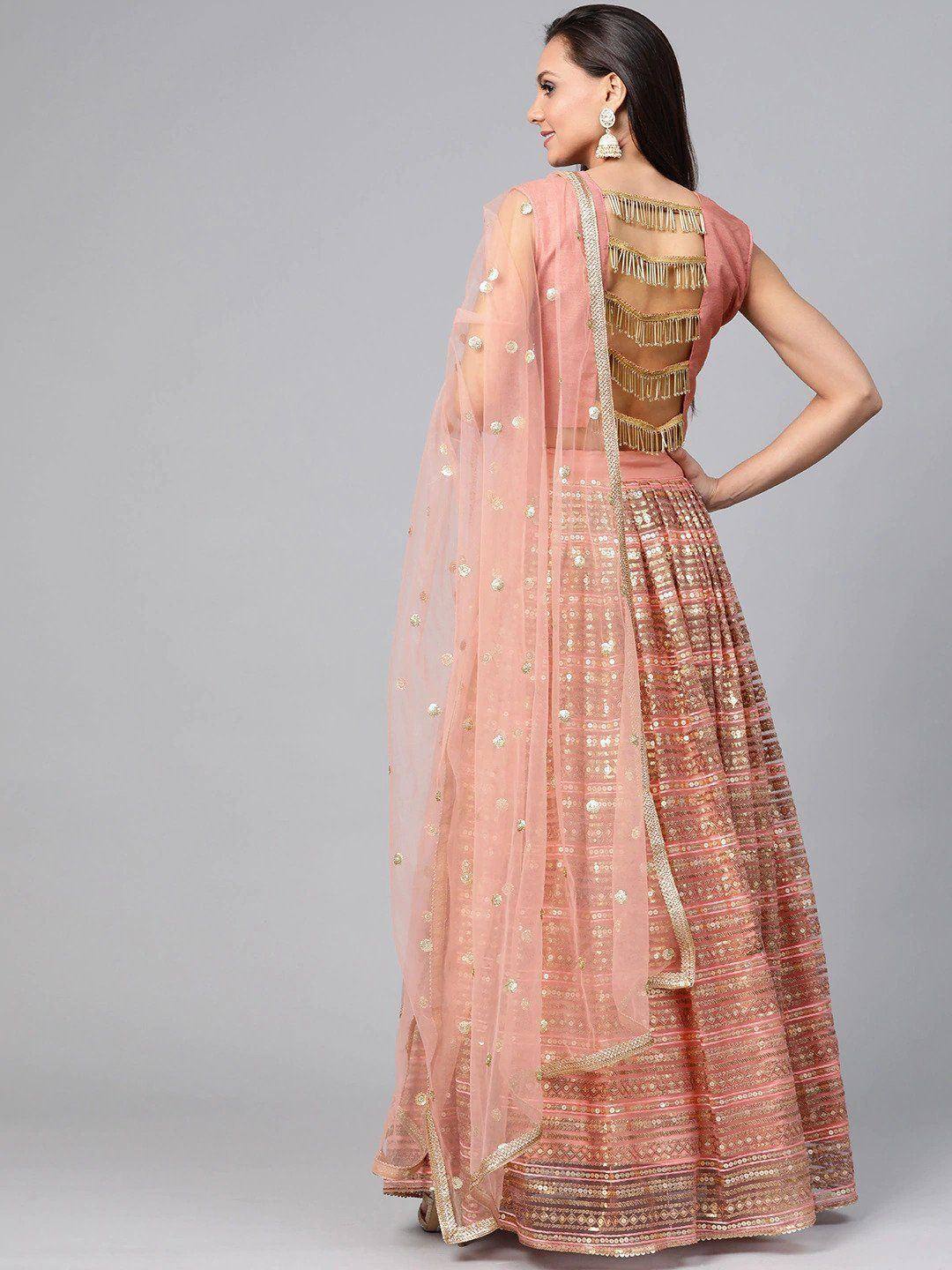 Pink designer lehenga choli with gold fringe back and sequin dupatta, ethnic Indian wear