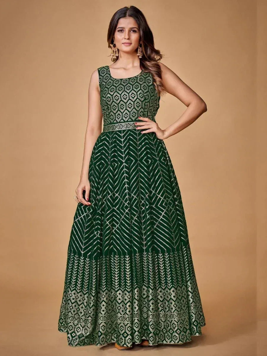 Emerald green ethnic gown with geometric embroidery, perfect for Indian occasions and festive wear.