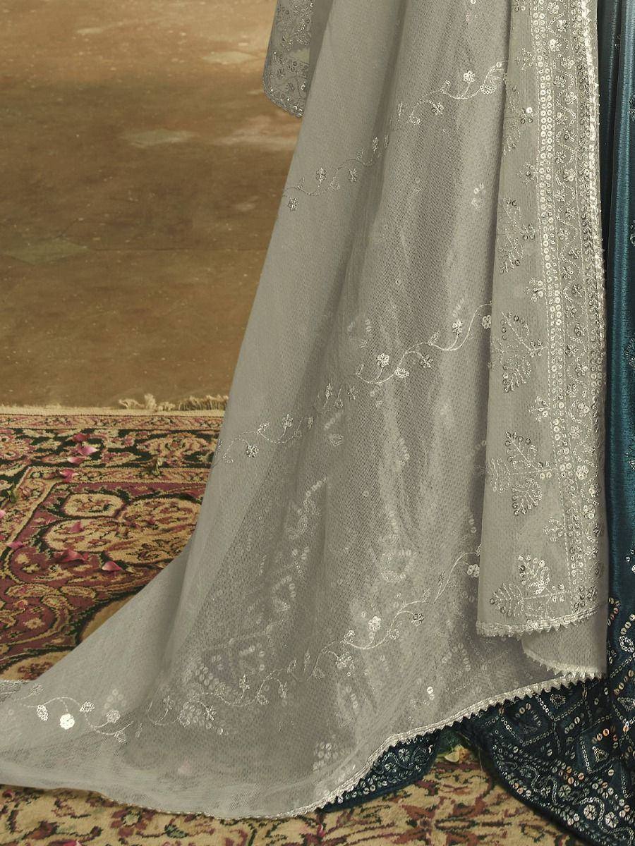 Grey embroidered ethnic gown with silver threadwork, perfect for Indian occasions