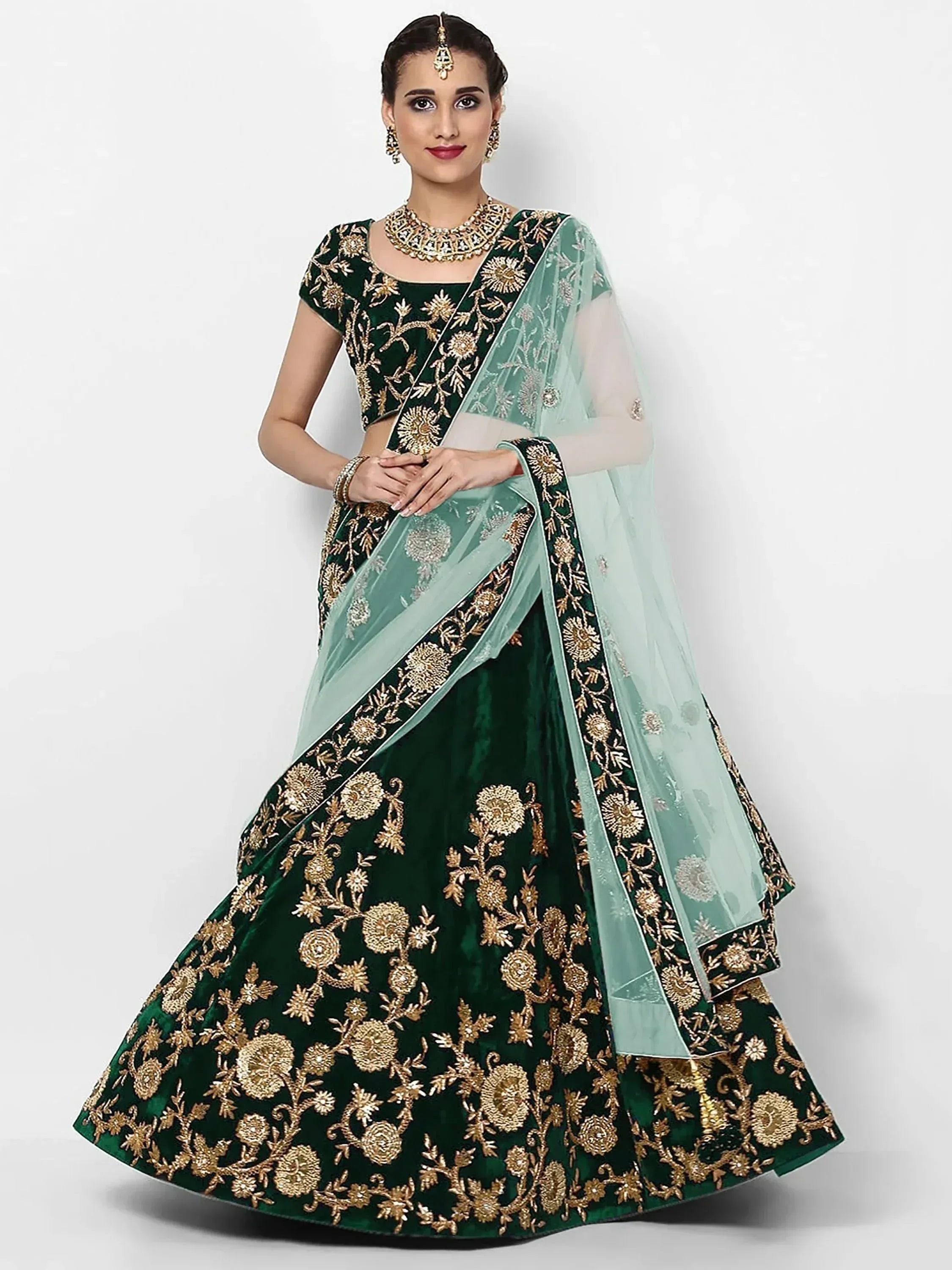 Emerald green velvet lehenga choli with gold floral embroidery and light blue dupatta, Indian ethnic wear