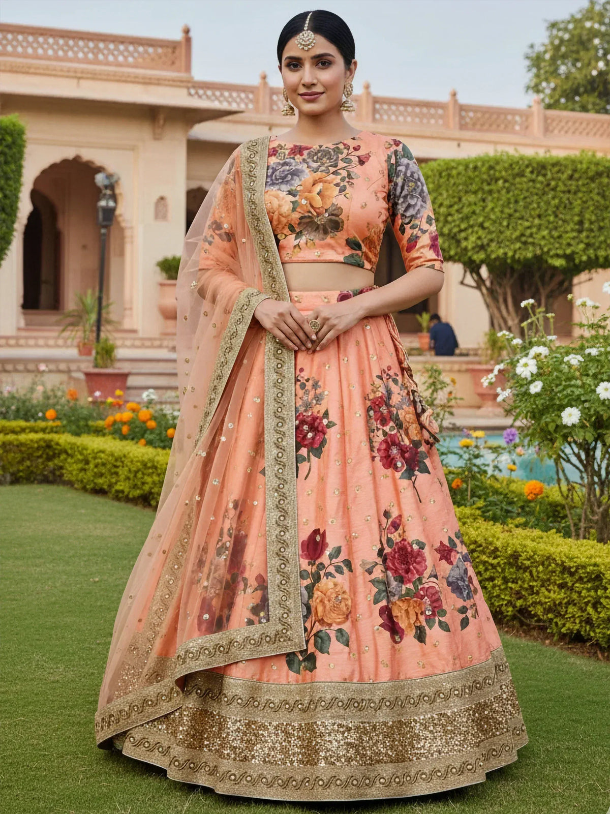 Peach floral lehenga choli with gold embroidery, perfect for Indian weddings and festive occasions.