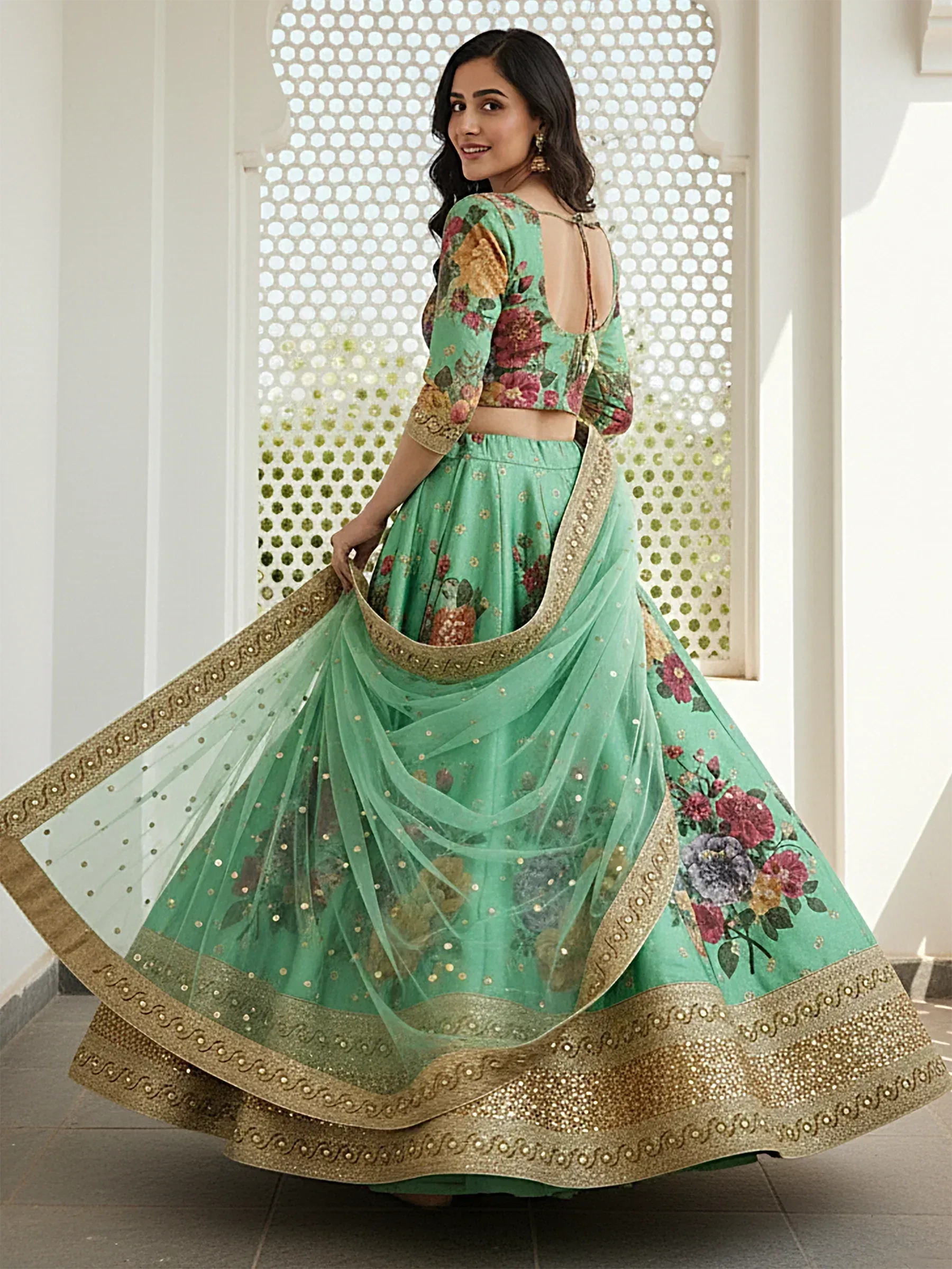 Mint green floral lehenga choli with gold embroidery, perfect for Indian ethnic wear and festive occasions.