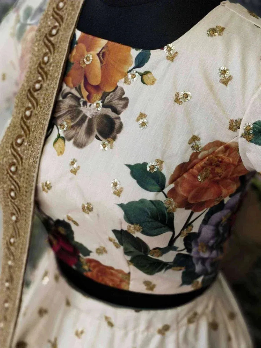 Floral printed ethnic gown with gold sequin detailing and embroidered border, perfect for Indian occasions
