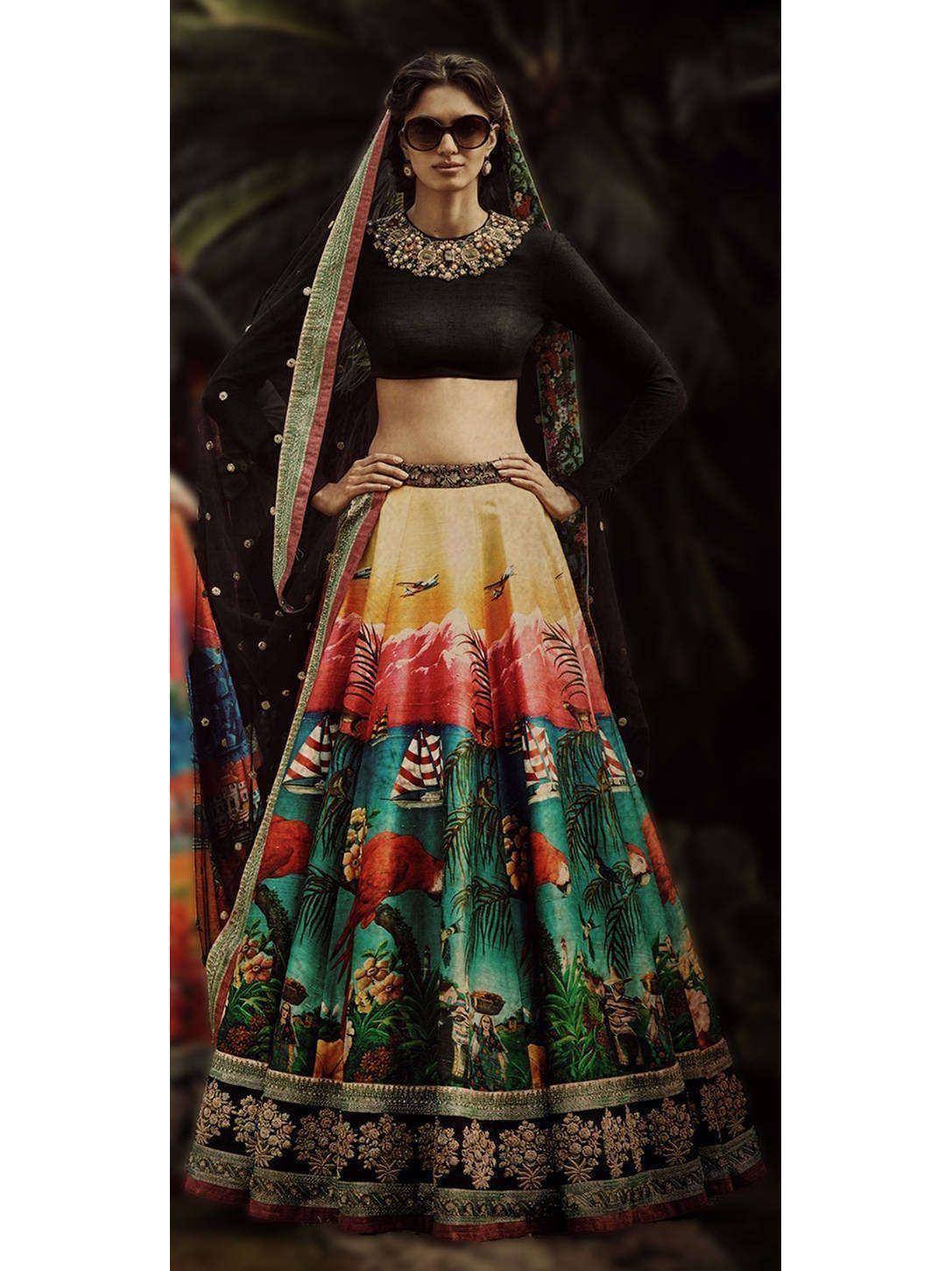 Designer lehenga choli with vibrant tropical print, black blouse, and embroidered dupatta for ethnic wear
