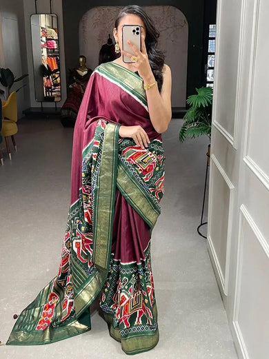 Enchanting Maroon Patola Printed Dola Silk Festival Wear Saree