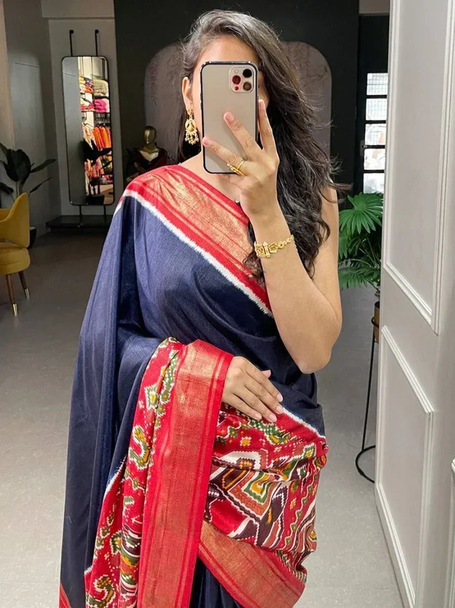 Woman in navy blue saree with red ikat border, ethnic Indian wear, mirror selfie
