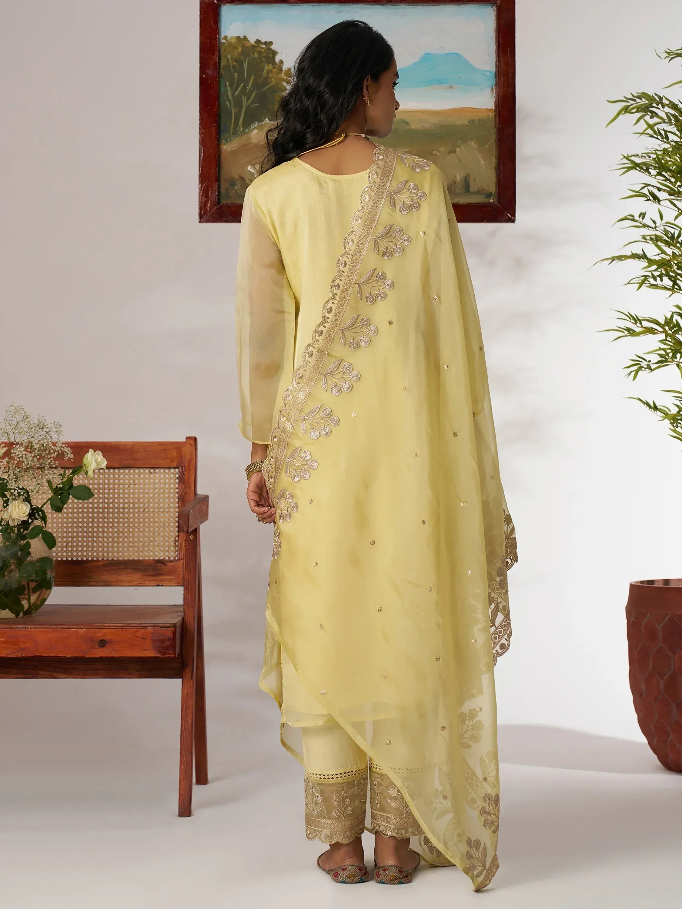 Yellow embroidered salwar kameez with floral dupatta, ethnic Indian wear for women
