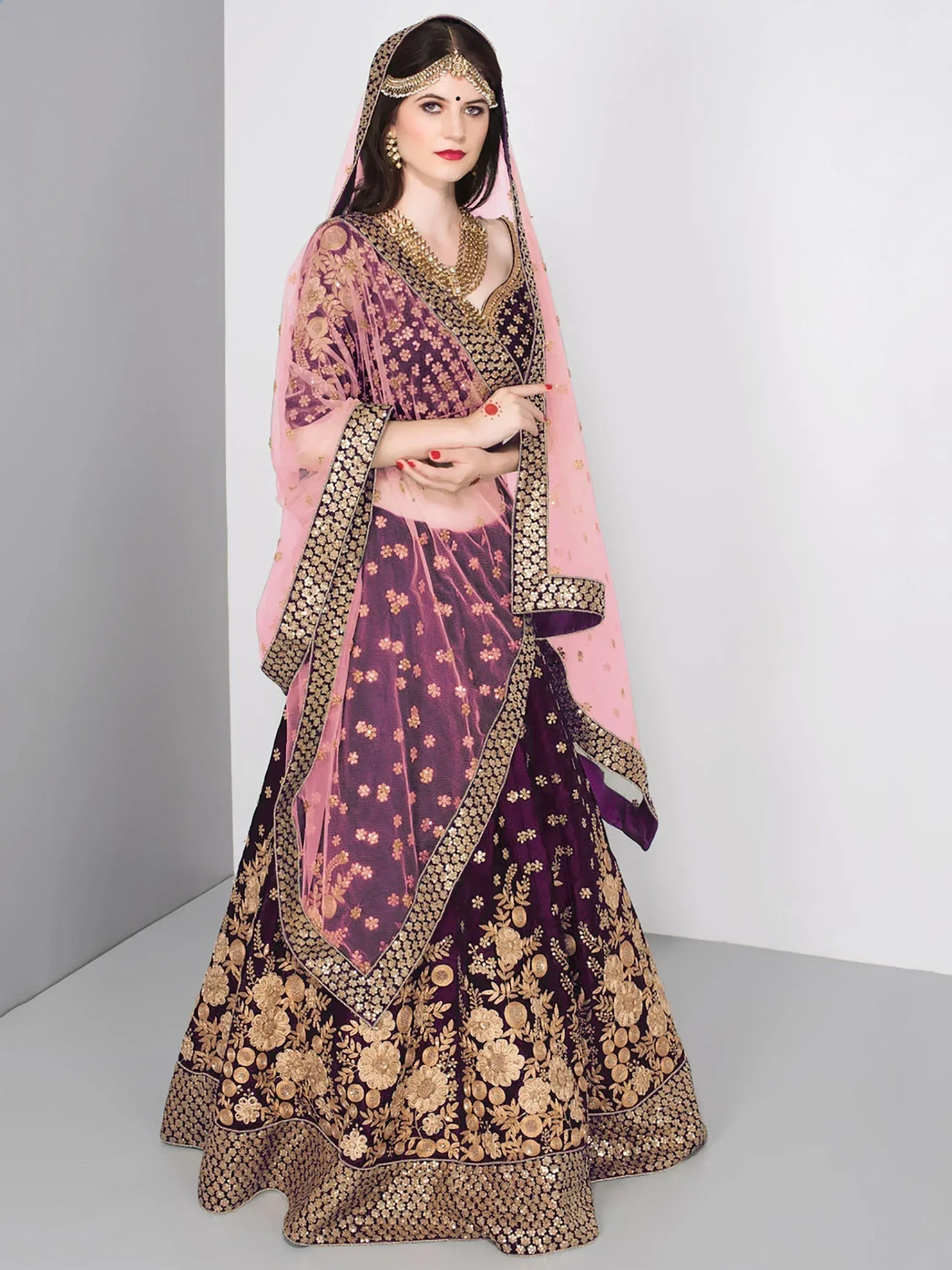Purple and gold embroidered lehenga choli with pink dupatta, Indian ethnic wear for weddings