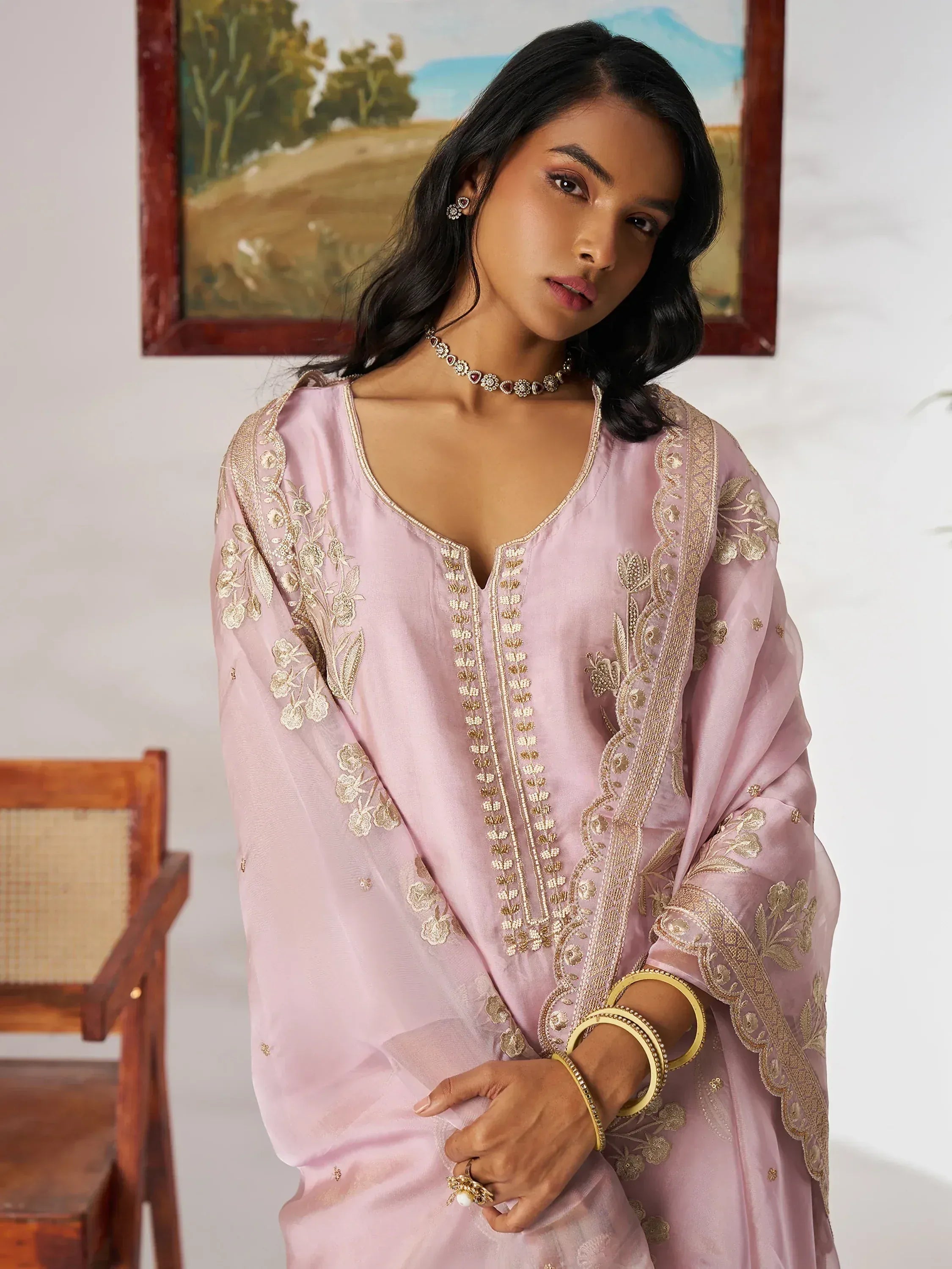 Pink embroidered ethnic kurta with gold floral detailing, perfect for Indian wear occasions