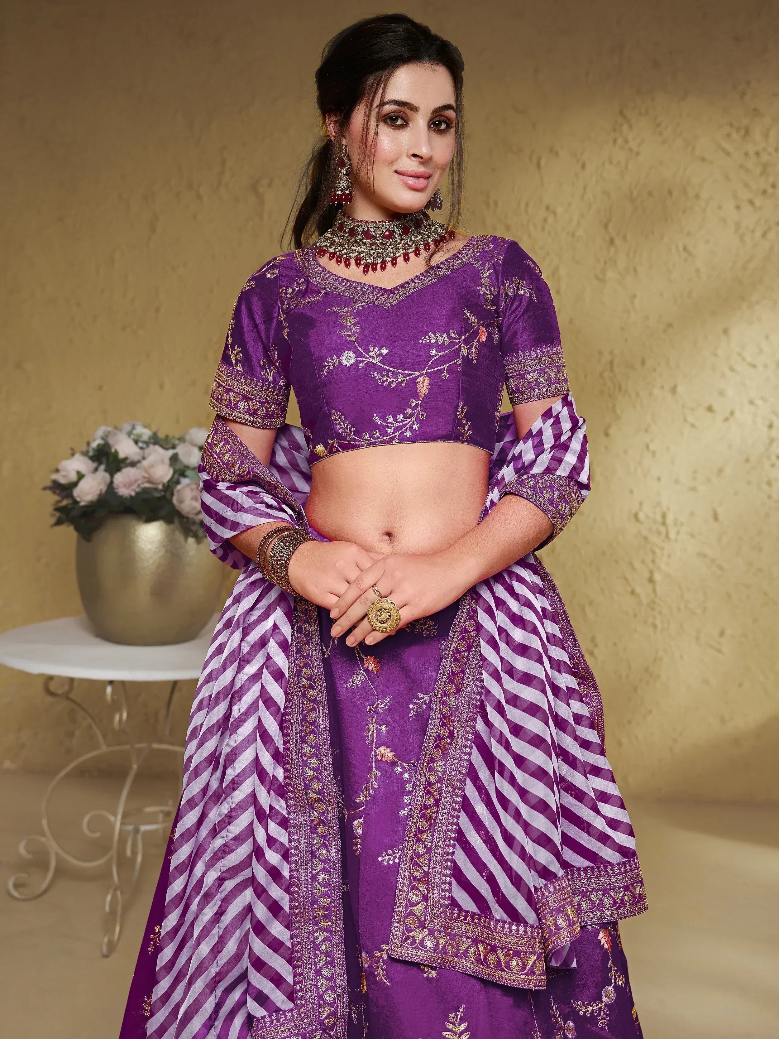 Purple embroidered lehenga choli with striped dupatta, perfect for Indian ethnic wear