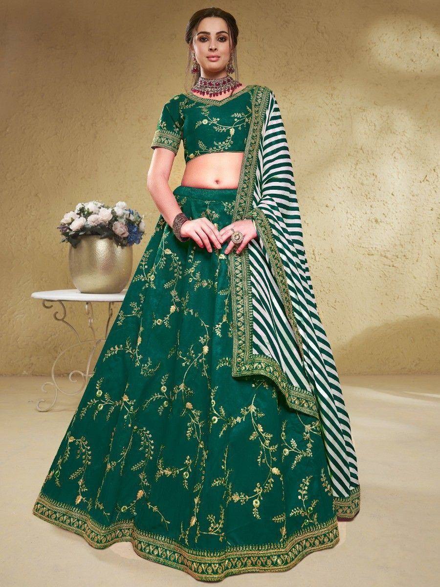 Emerald green lehenga choli with gold floral embroidery and striped dupatta, perfect for Indian ethnic wear occasions.