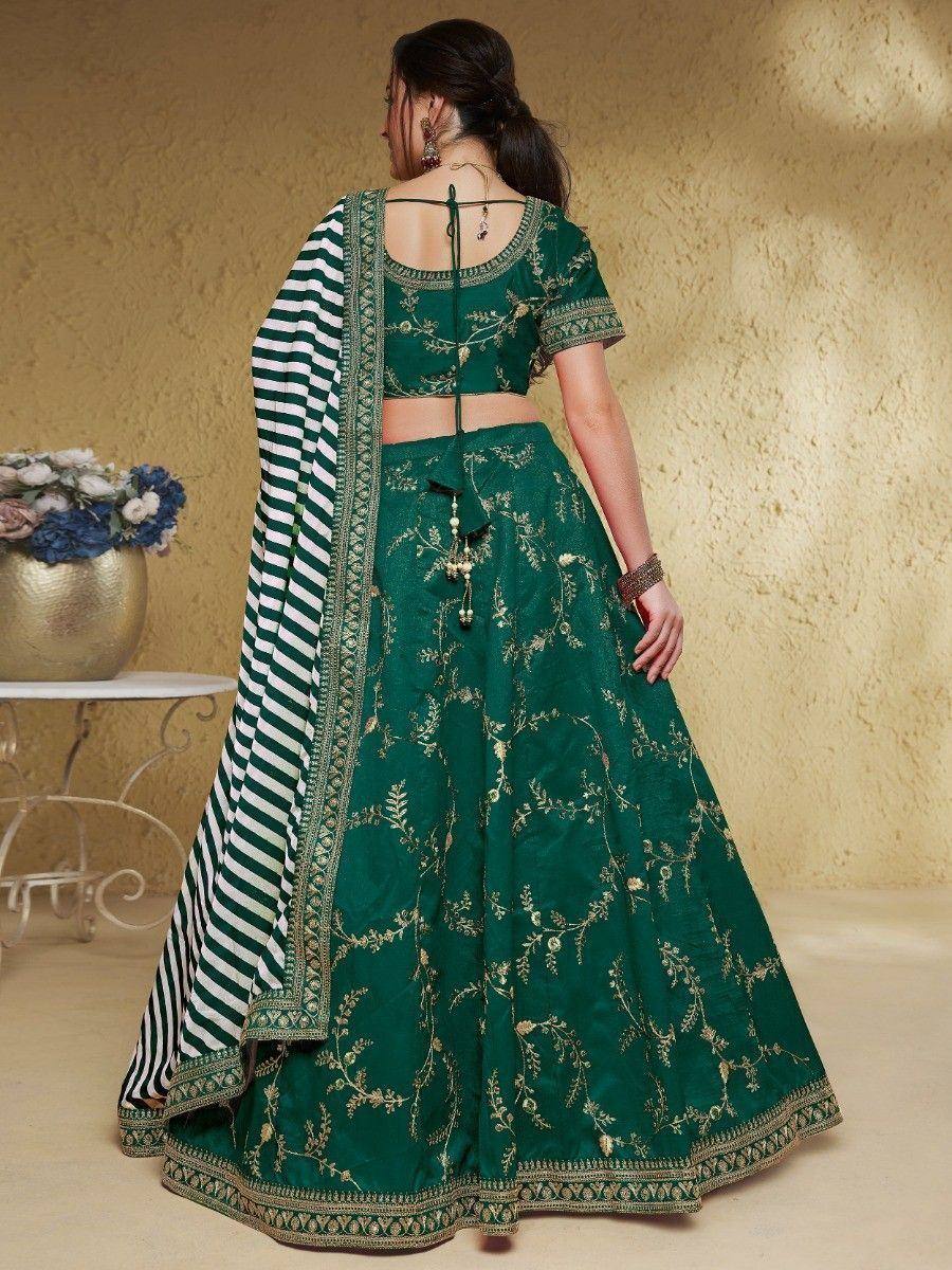 Emerald green lehenga choli with gold embroidery and striped dupatta, perfect for Indian ethnic occasions