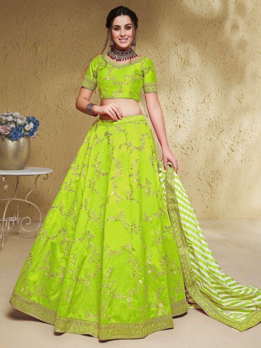 Vibrant green embroidered lehenga choli with striped dupatta, perfect for Indian ethnic occasions