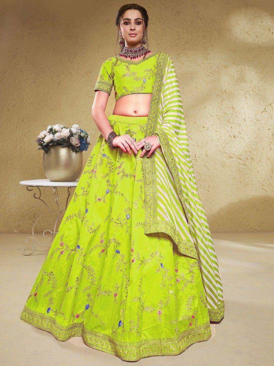 Vibrant lime green embroidered lehenga choli with striped dupatta, perfect for Indian ethnic occasions