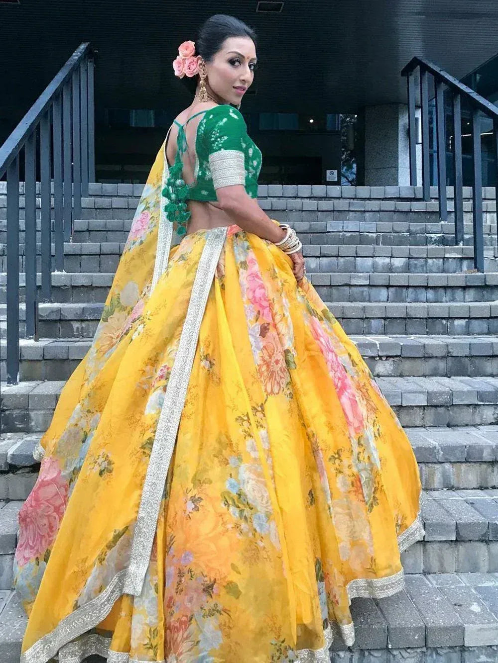 Yellow floral lehenga choli with green blouse, perfect for Indian ethnic wear occasions