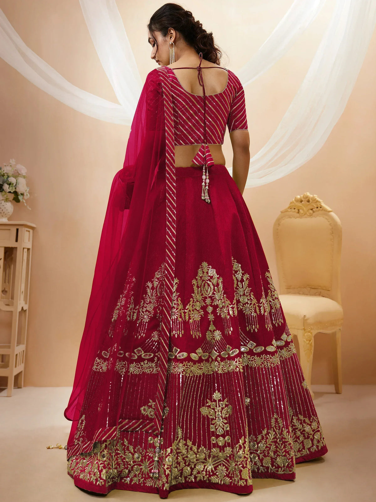 Maroon lehenga choli with gold embroidery, back view, for Indian ethnic wear