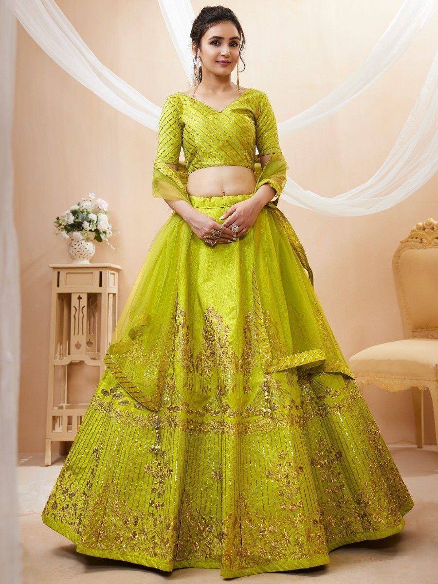 Lime green designer lehenga choli with gold embroidery, perfect for weddings and festive occasions