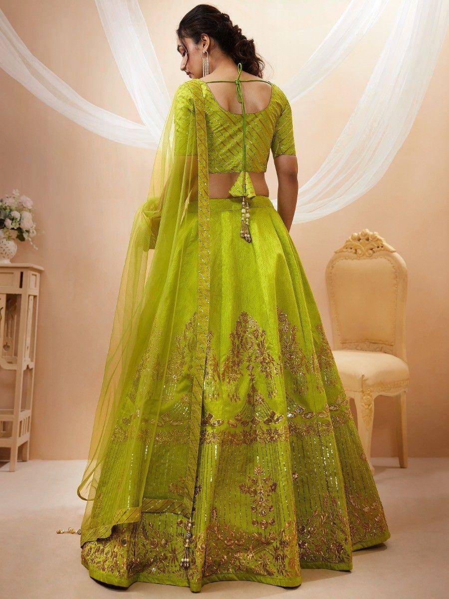 Lime green designer lehenga choli with gold embroidery, perfect for weddings and festive occasions