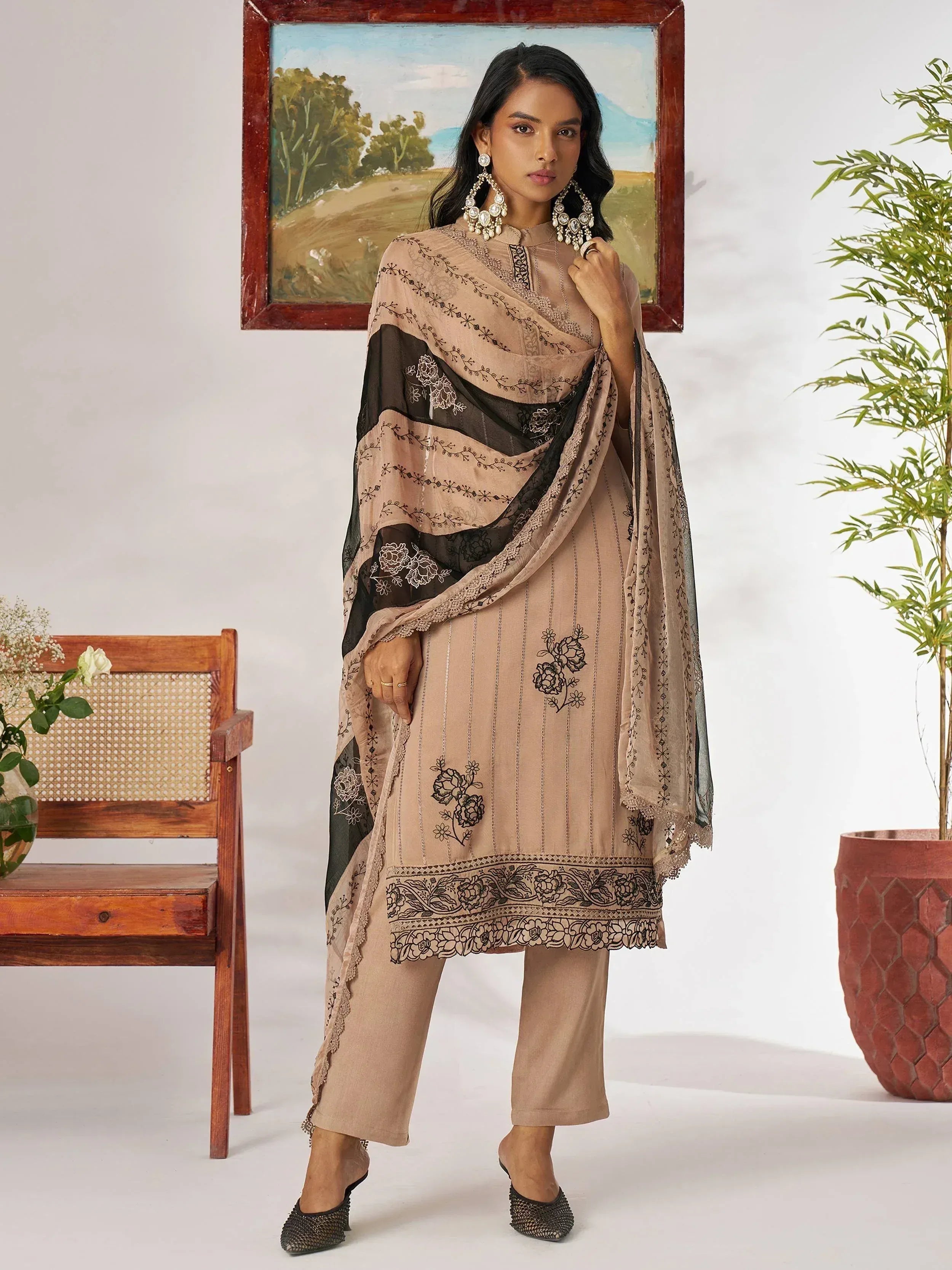 Beige embroidered salwar kameez with black floral dupatta, perfect for Indian ethnic wear occasions