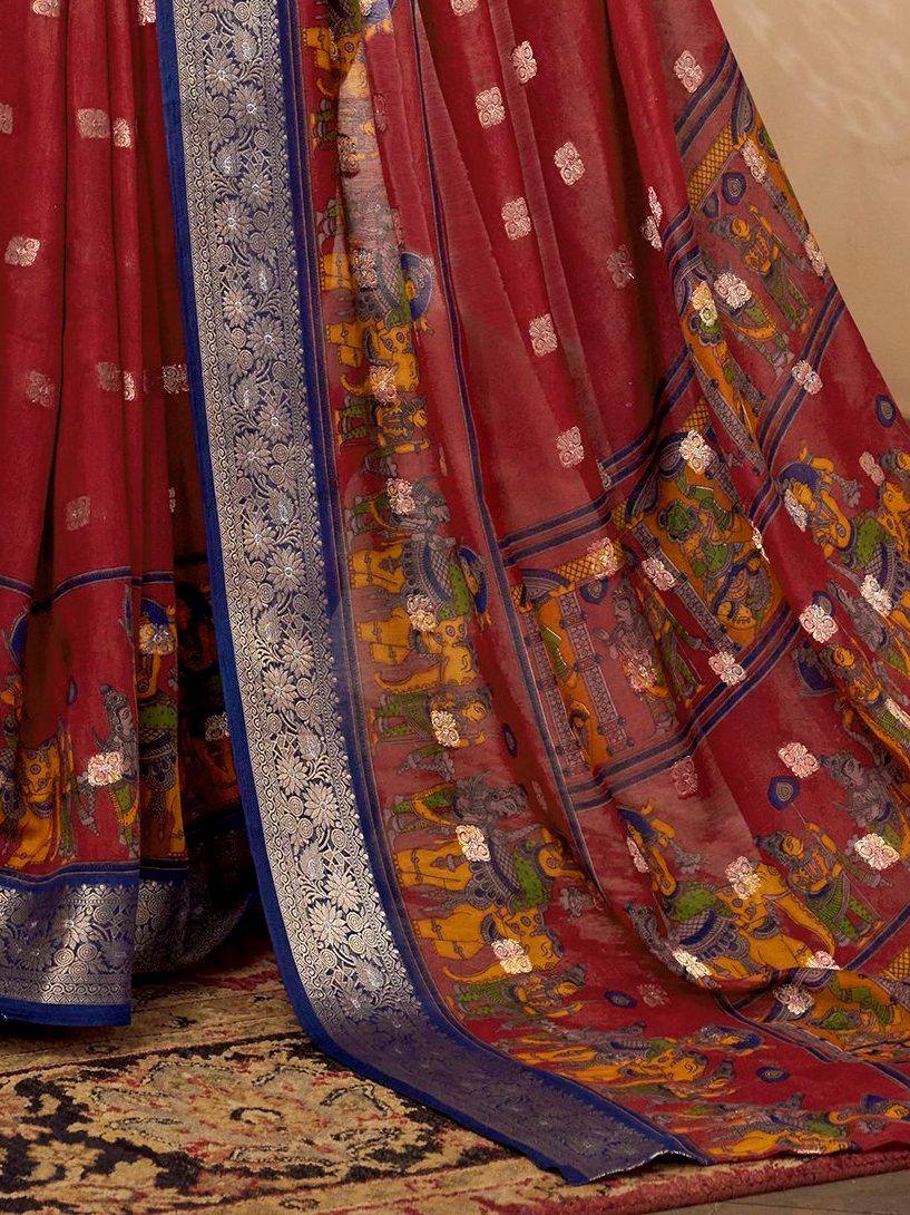 Red ethnic saree with intricate temple print and silver zari border, perfect for festive occasions