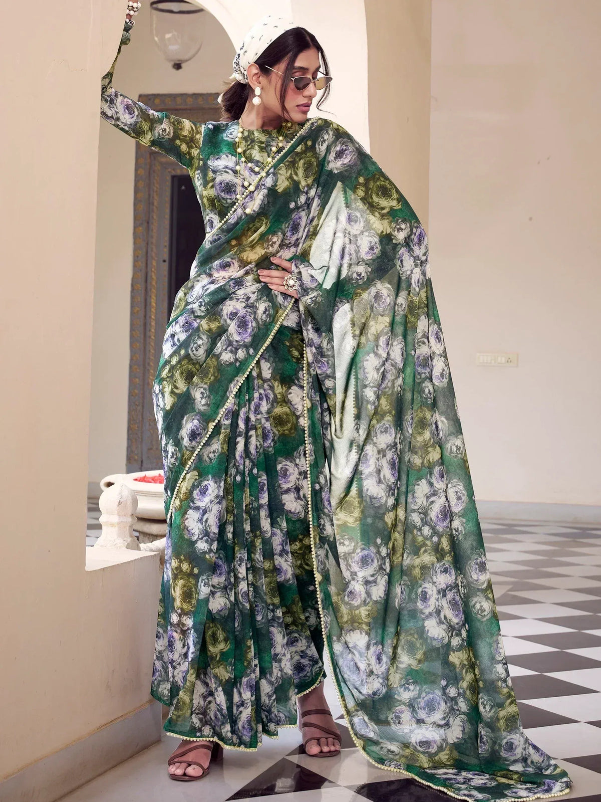 Green floral printed saree with pearl border, styled with headscarf and sunglasses for ethnic wear