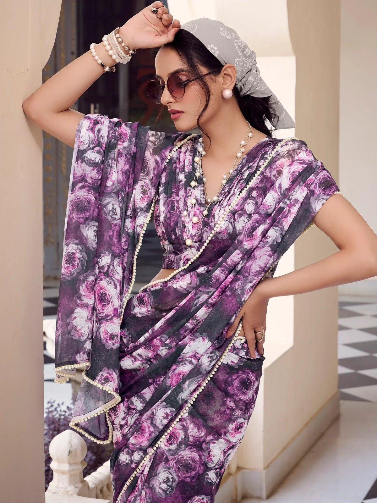 Purple floral print saree with pearl trim, styled with headscarf and sunglasses for ethnic fashion