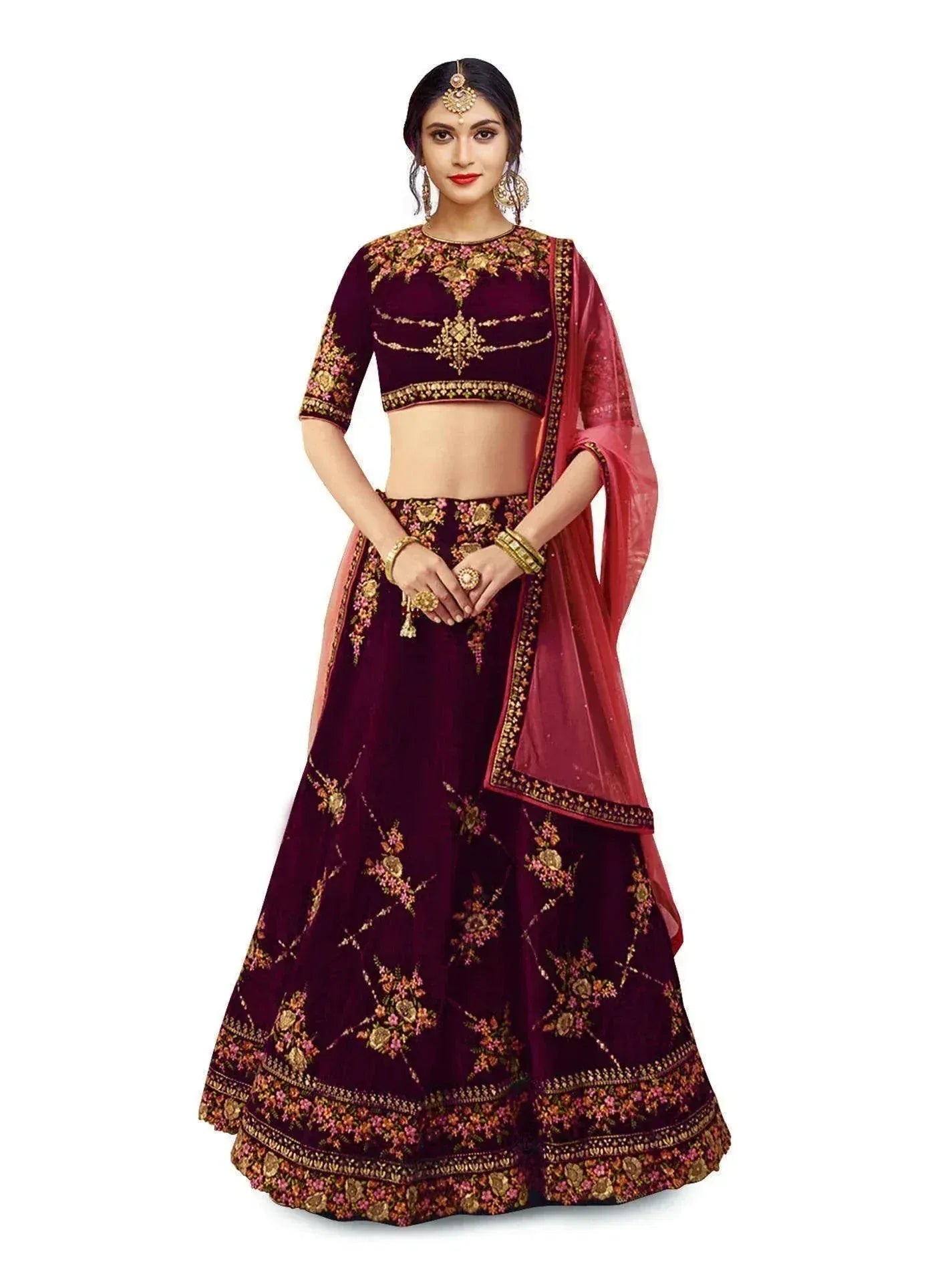 Burgundy velvet lehenga choli with gold floral embroidery and matching dupatta, ideal for Indian weddings and festive occasions.
