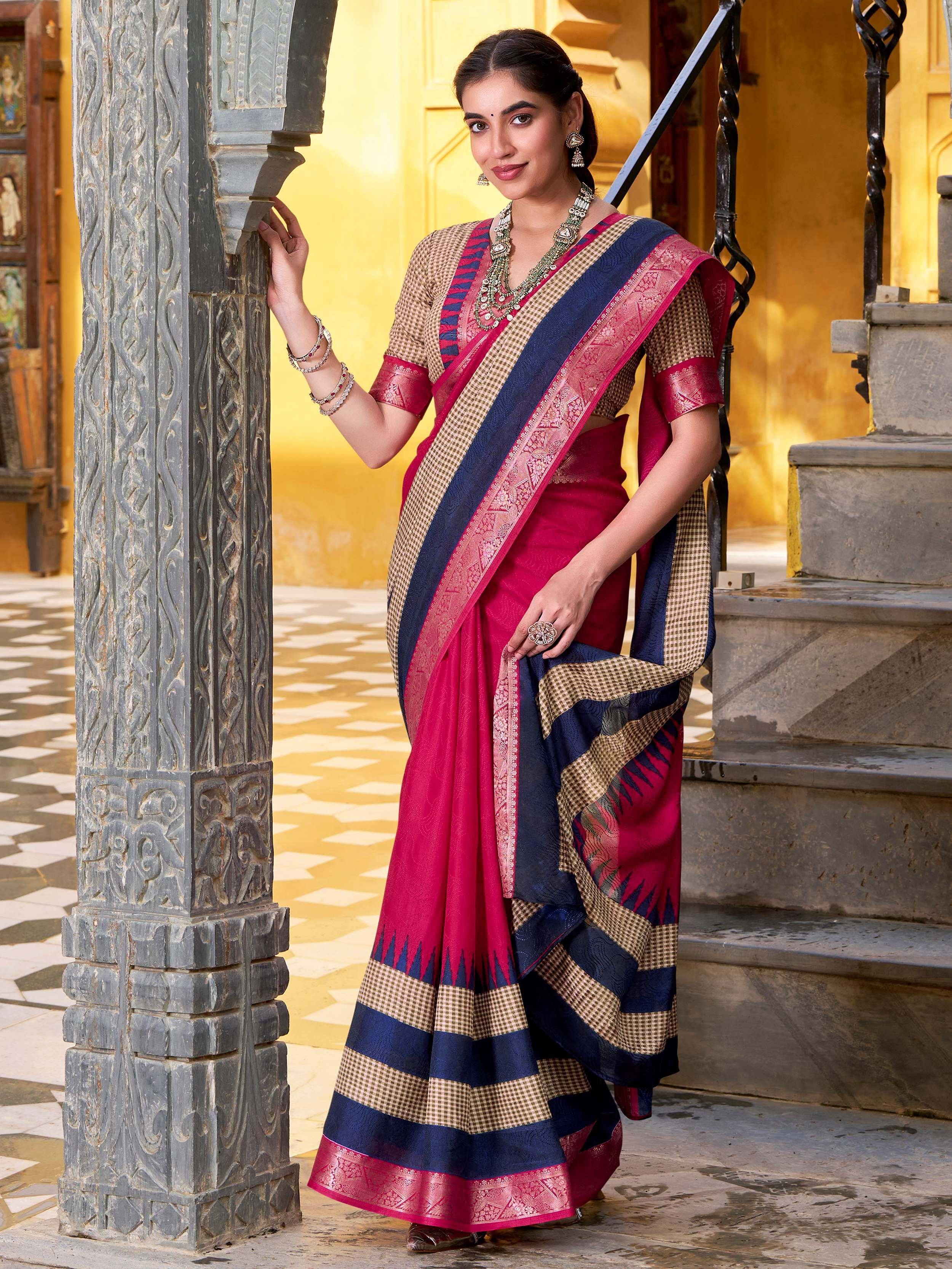 Woman in elegant pink and navy blue designer saree with gold checks, perfect for Indian ethnic occasions